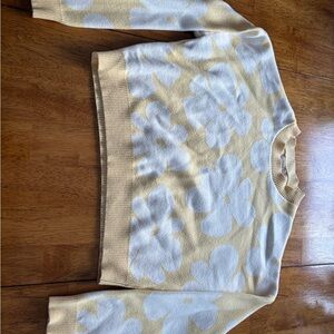 Light yellow sweater with white flowers!